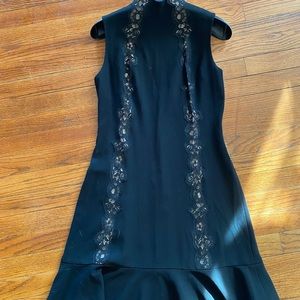 Sleeveless black crepe lace trim dress